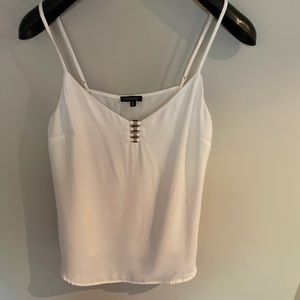 Classic white blouse with gold accents